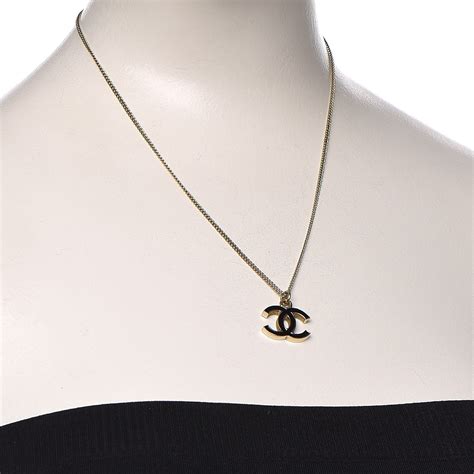 mens gold chanel necklace|chanel black and white necklace.